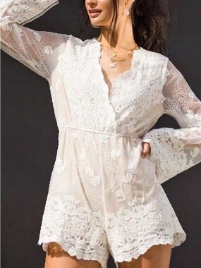 Beautiful Women's romper laced over soft  beige